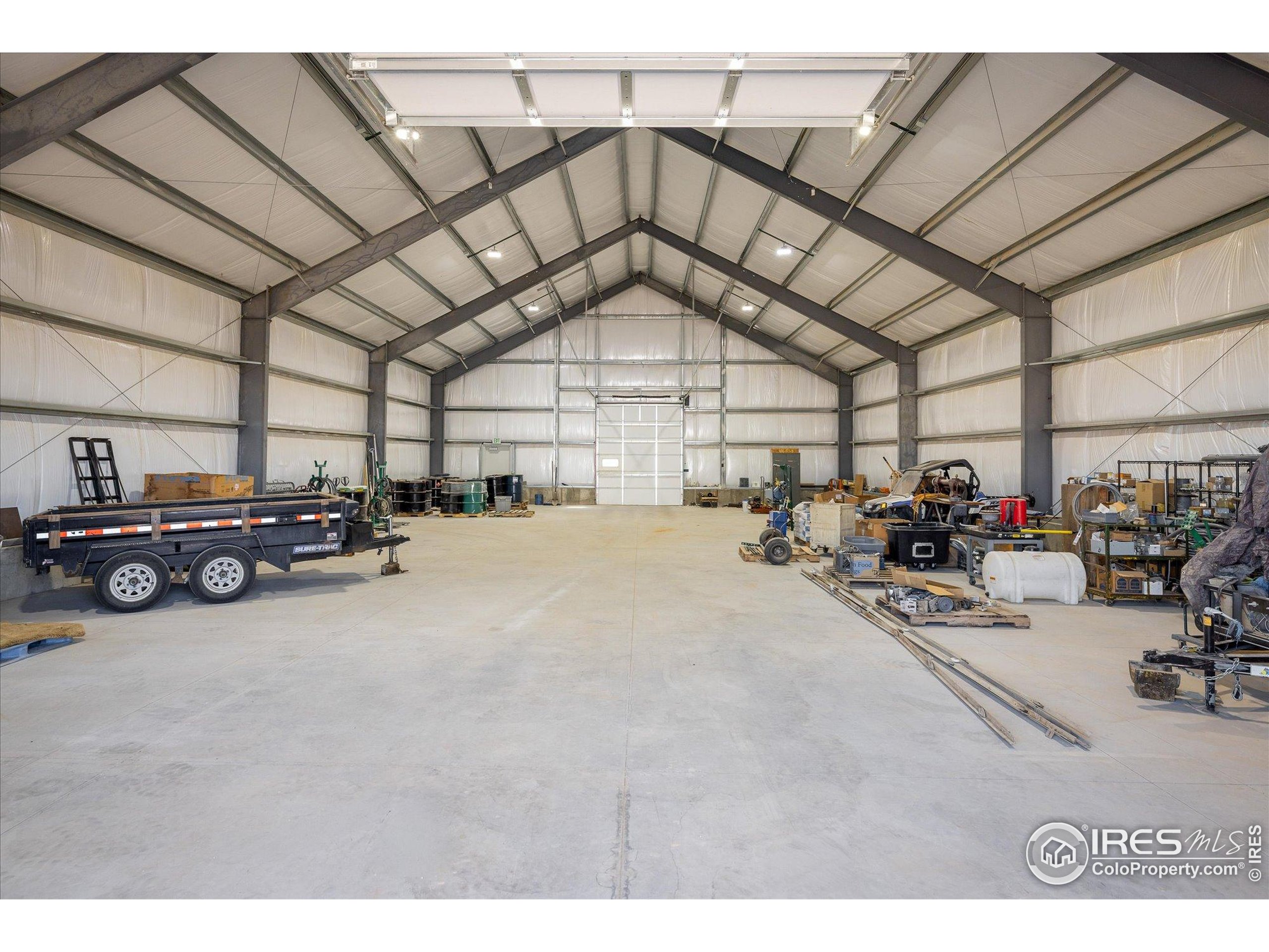 13400 Harvest Road Commerce City, CO 80022 - Photo 22 of 50 a view of parking garage with cars