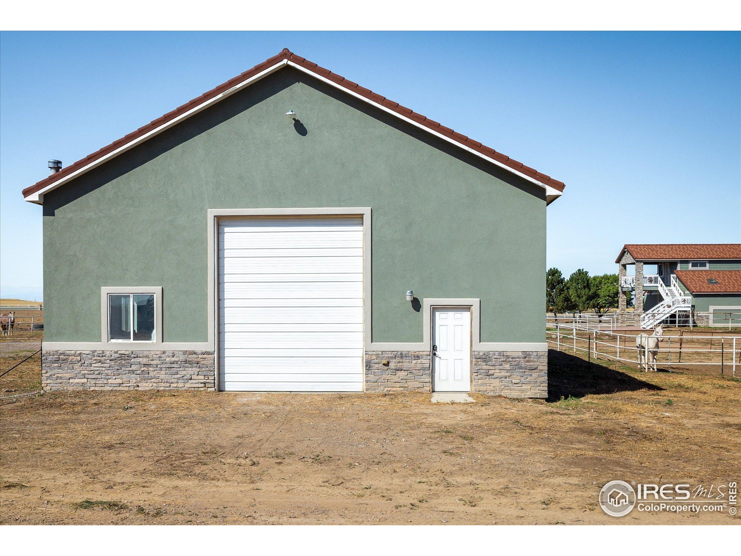 13400 Harvest Road Commerce City, CO 80022 - Photo 25 of 50 a house view with a outdoor space