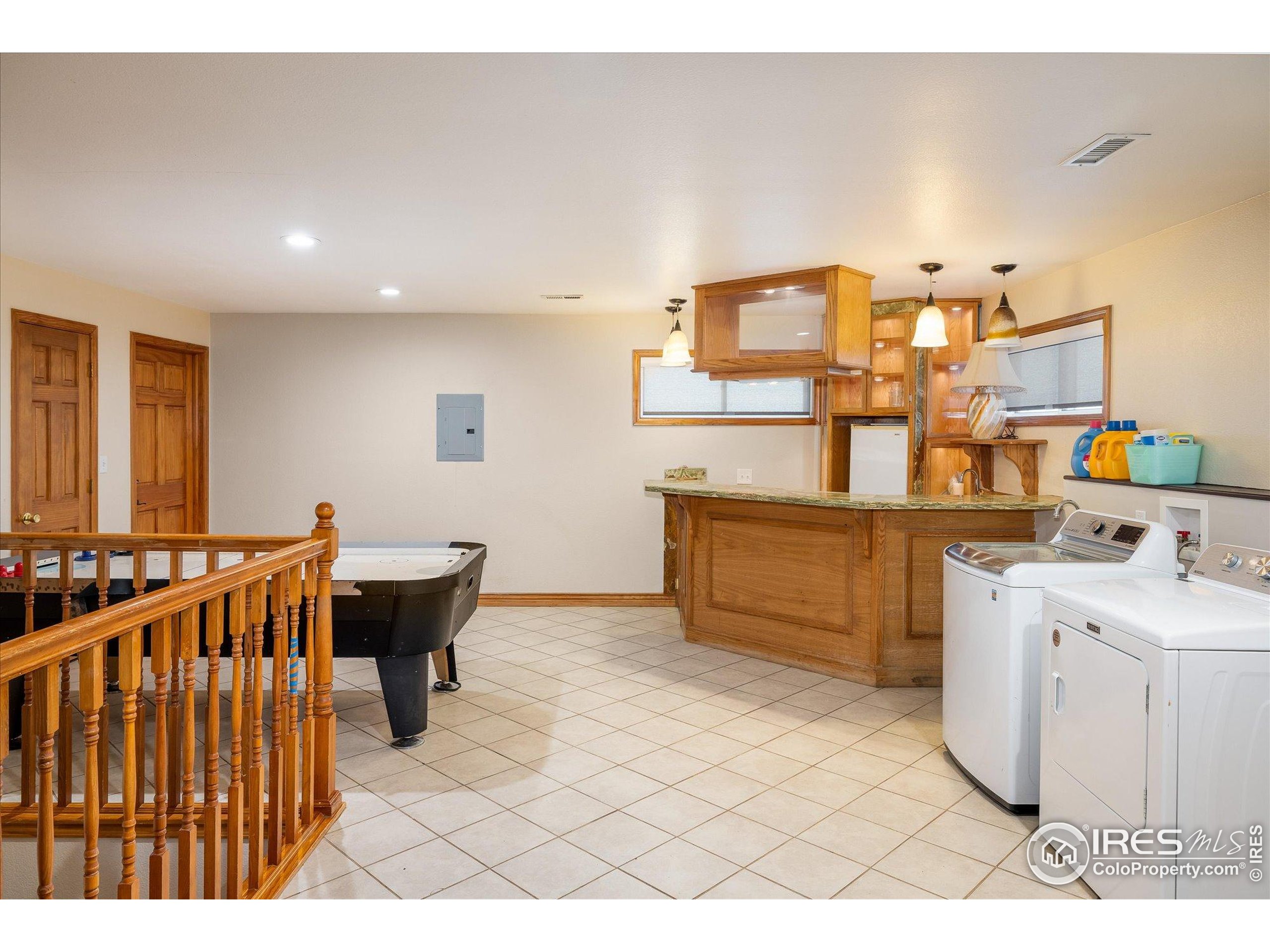 13400 Harvest Road Commerce City, CO 80022 - Photo 42 of 50 a storage room with washer and dryer