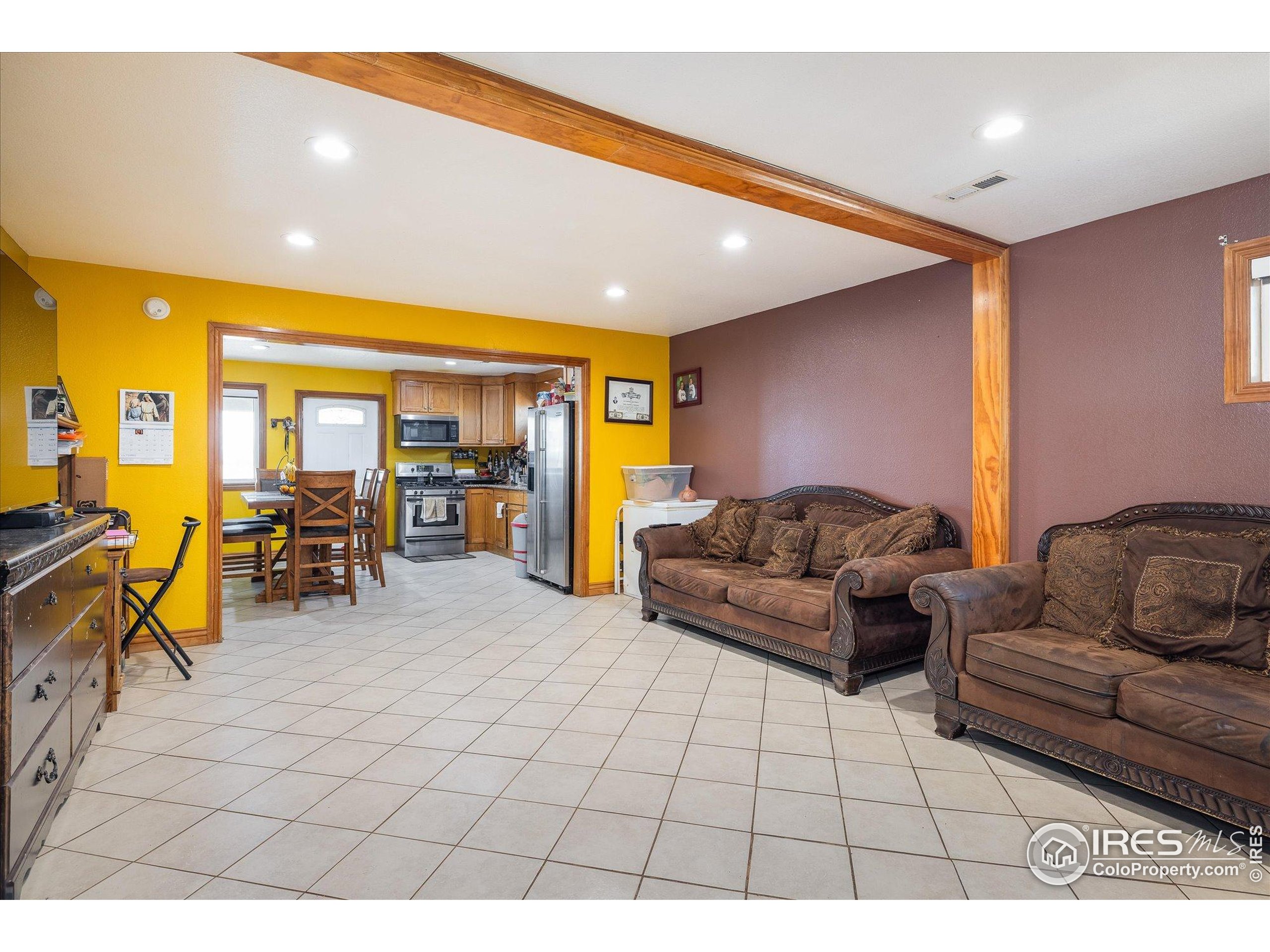 13400 Harvest Road Commerce City, CO 80022 - Photo 45 of 50 a living room with furniture and dining area