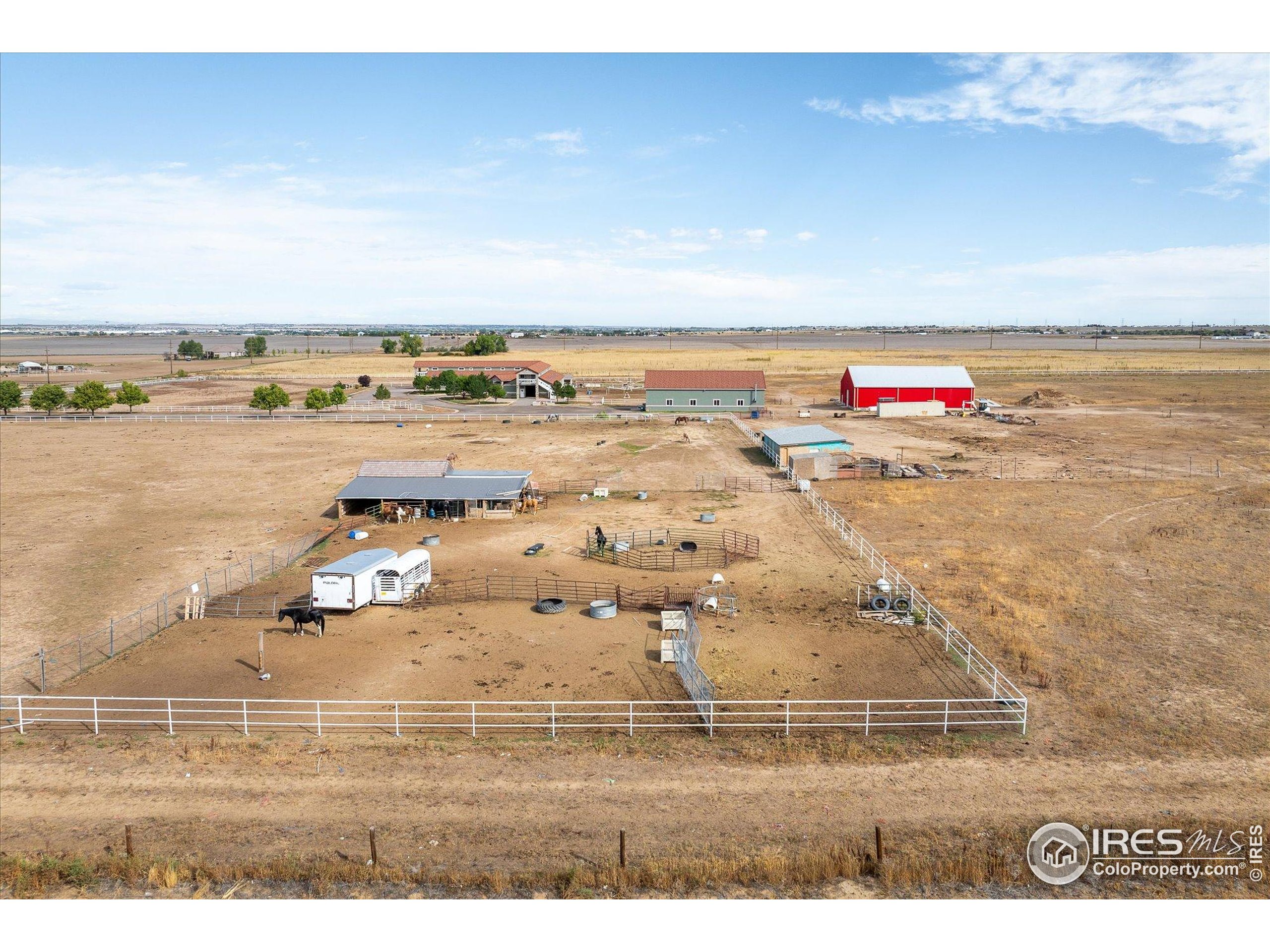 13400 Harvest Road Commerce City, CO 80022 - Photo 7 of 50 a view of a swimming pool and an ocean view