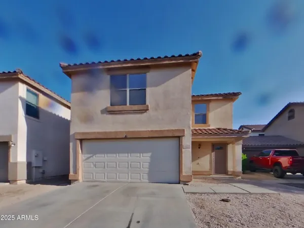 a house view with a outdoor space
