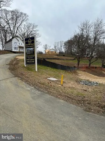 a view of swimming pool with outdoor seating