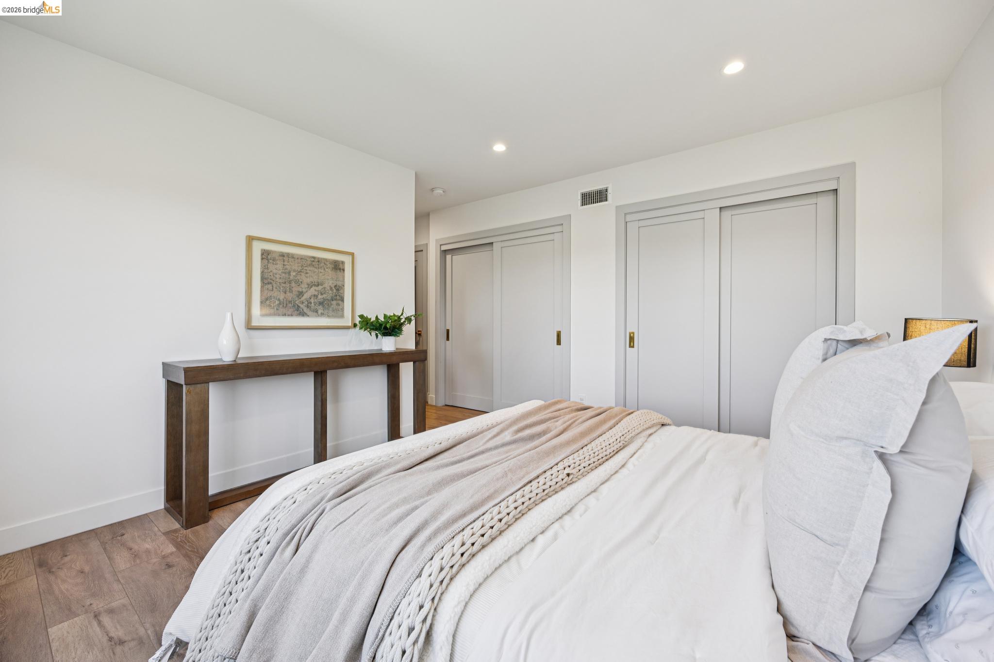 11 Belinda Court San Ramon, CA 94583 - Photo 23 of 33 Wood-finish flooring with white baseboards, recessed lighting, and a console table