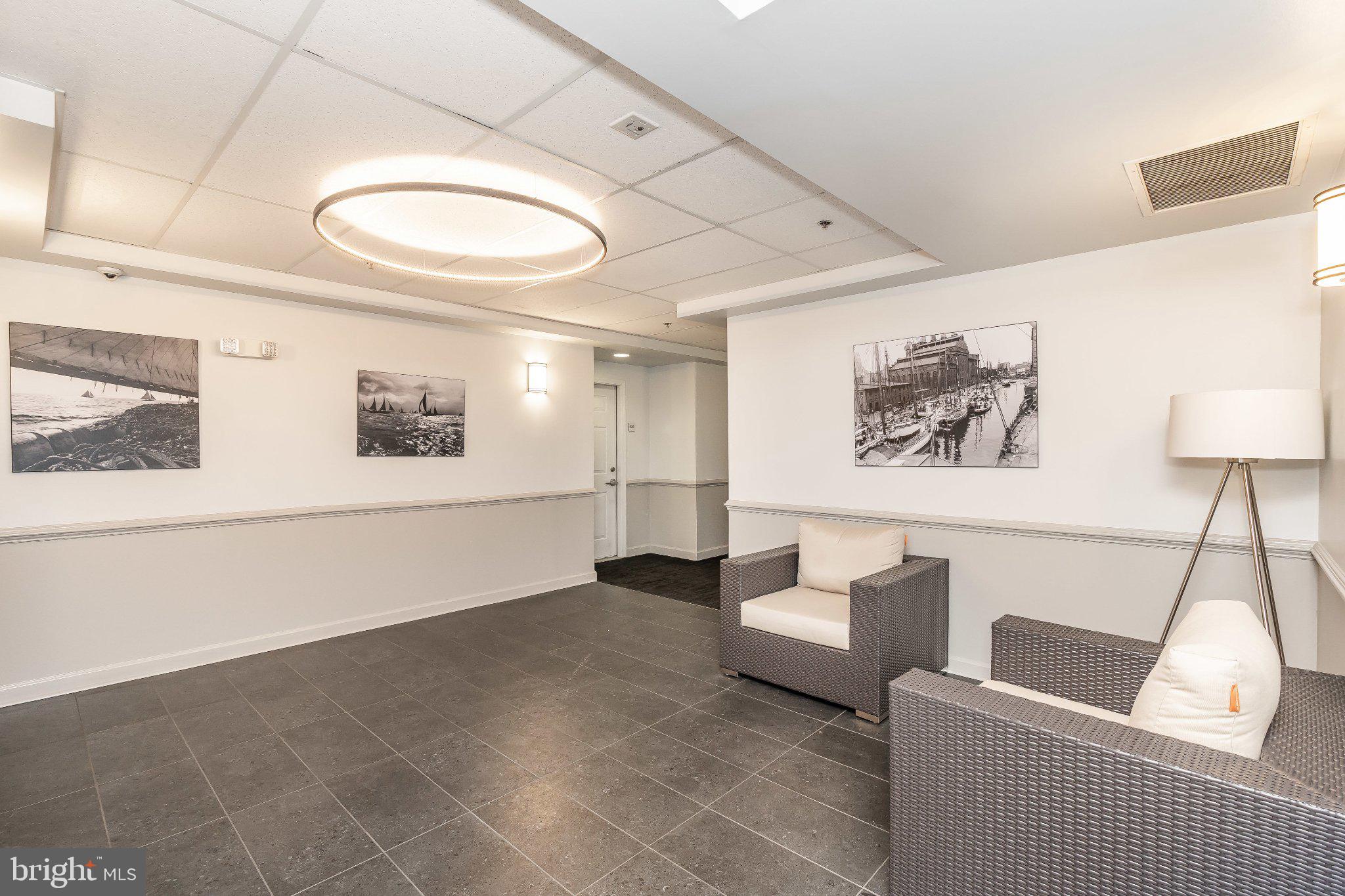 2702 Lighthouse Point East, Unit 532 Baltimore, MD 21224 - Photo 16 of 41 Modern lobby with artistic flair.
