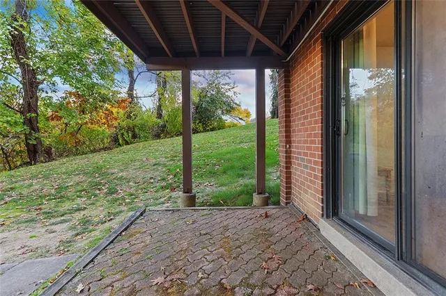 a view of a porch with a yard