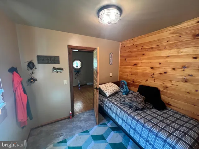 a kitchen with stainless steel appliances granite countertop a stove a refrigerator and a microwave