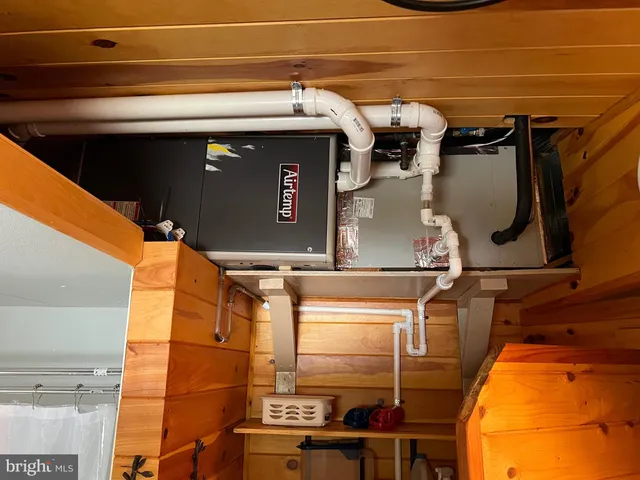 a kitchen with stainless steel appliances granite countertop a refrigerator a stove top oven a sink and dishwasher