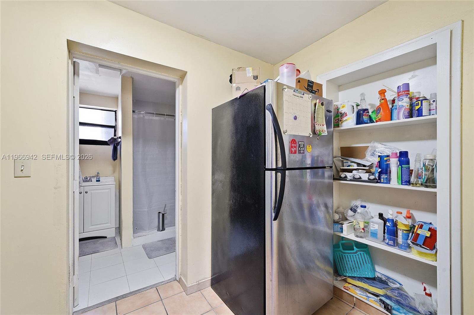 4791 West 3rd Avenue Hialeah, FL 33012 - Photo 24 of 30 a storage room with cabinets