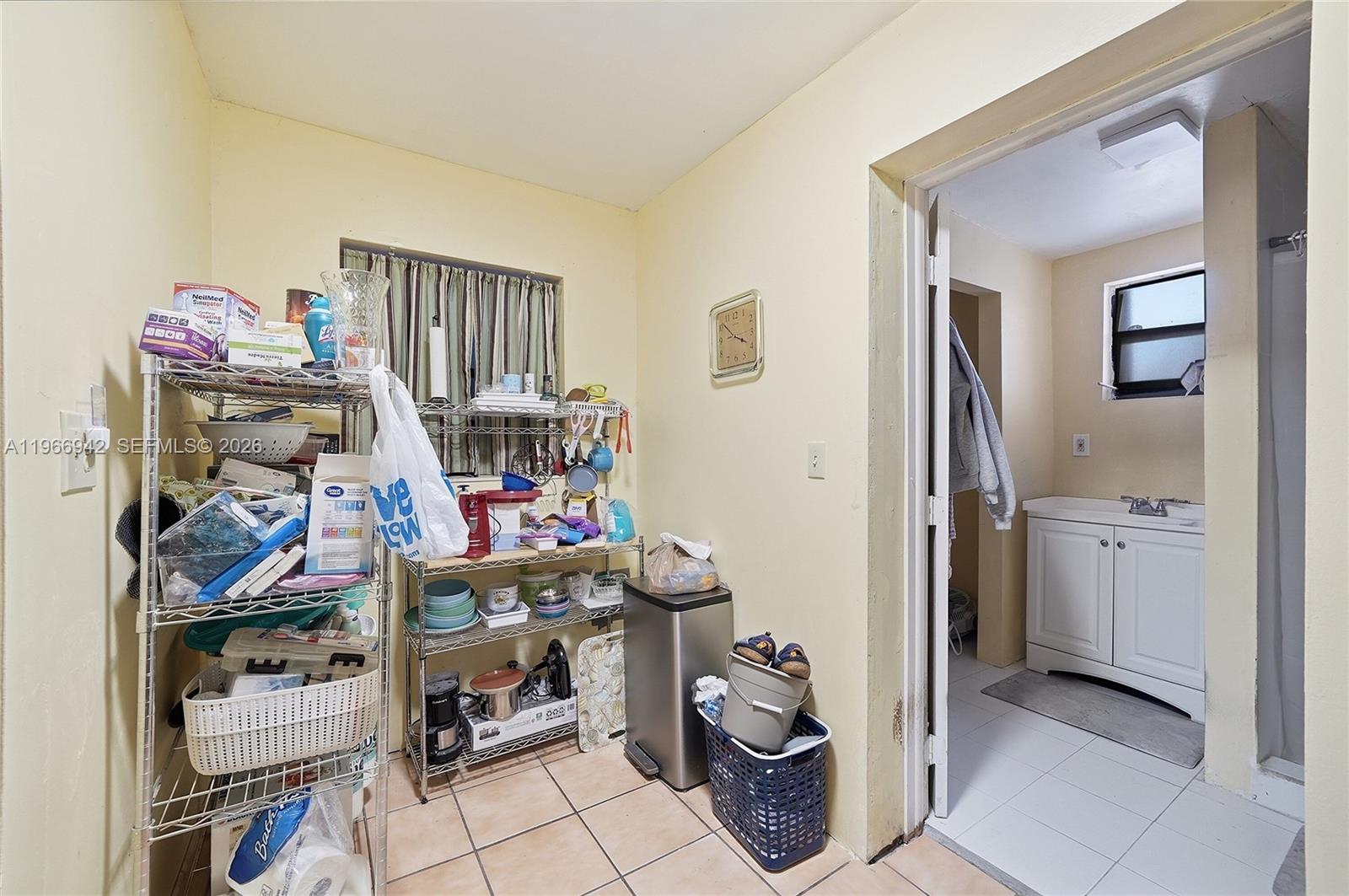 4791 West 3rd Avenue Hialeah, FL 33012 - Photo 25 of 30 a room with storage and utility