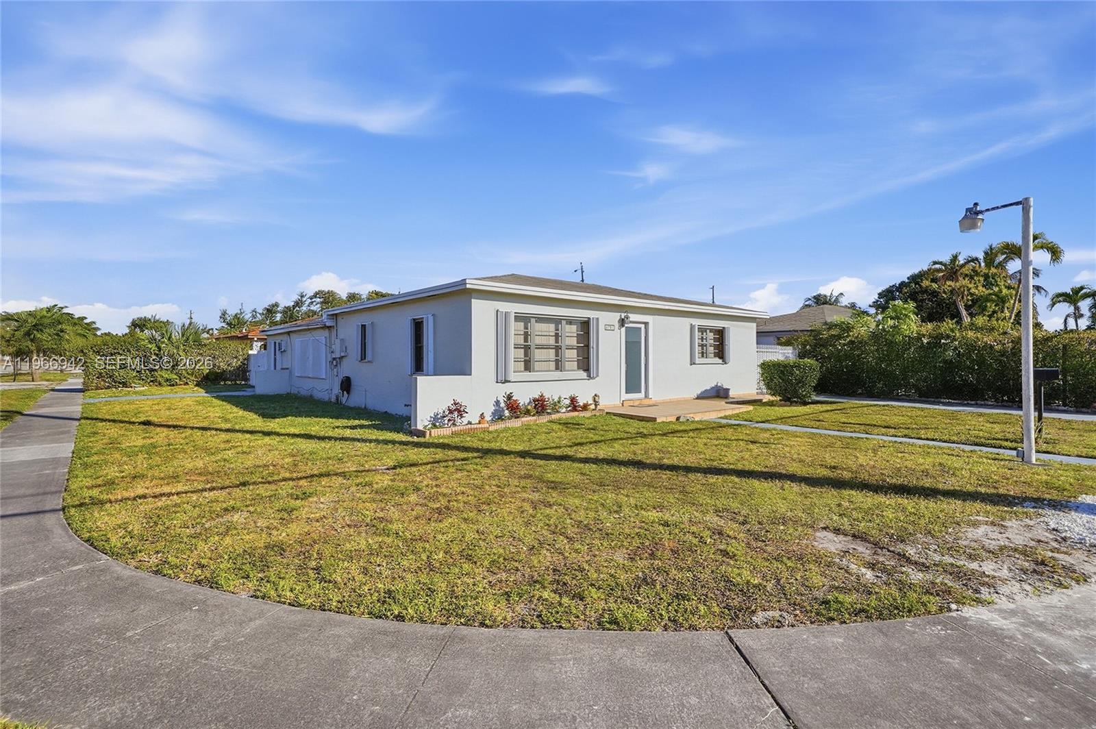 4791 West 3rd Avenue Hialeah, FL 33012 - Photo 4 of 30 a view of a house with a swimming pool