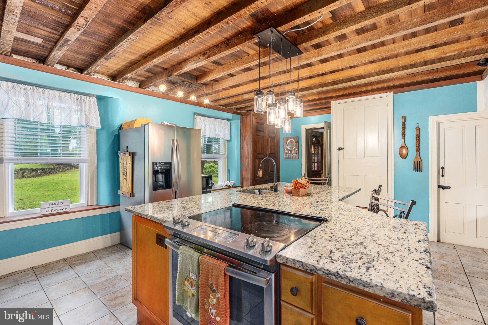 4701 Edges Mill Road Downingtown, PA 19335 - Photo 13 of 56 a kitchen with sink and refrigerator