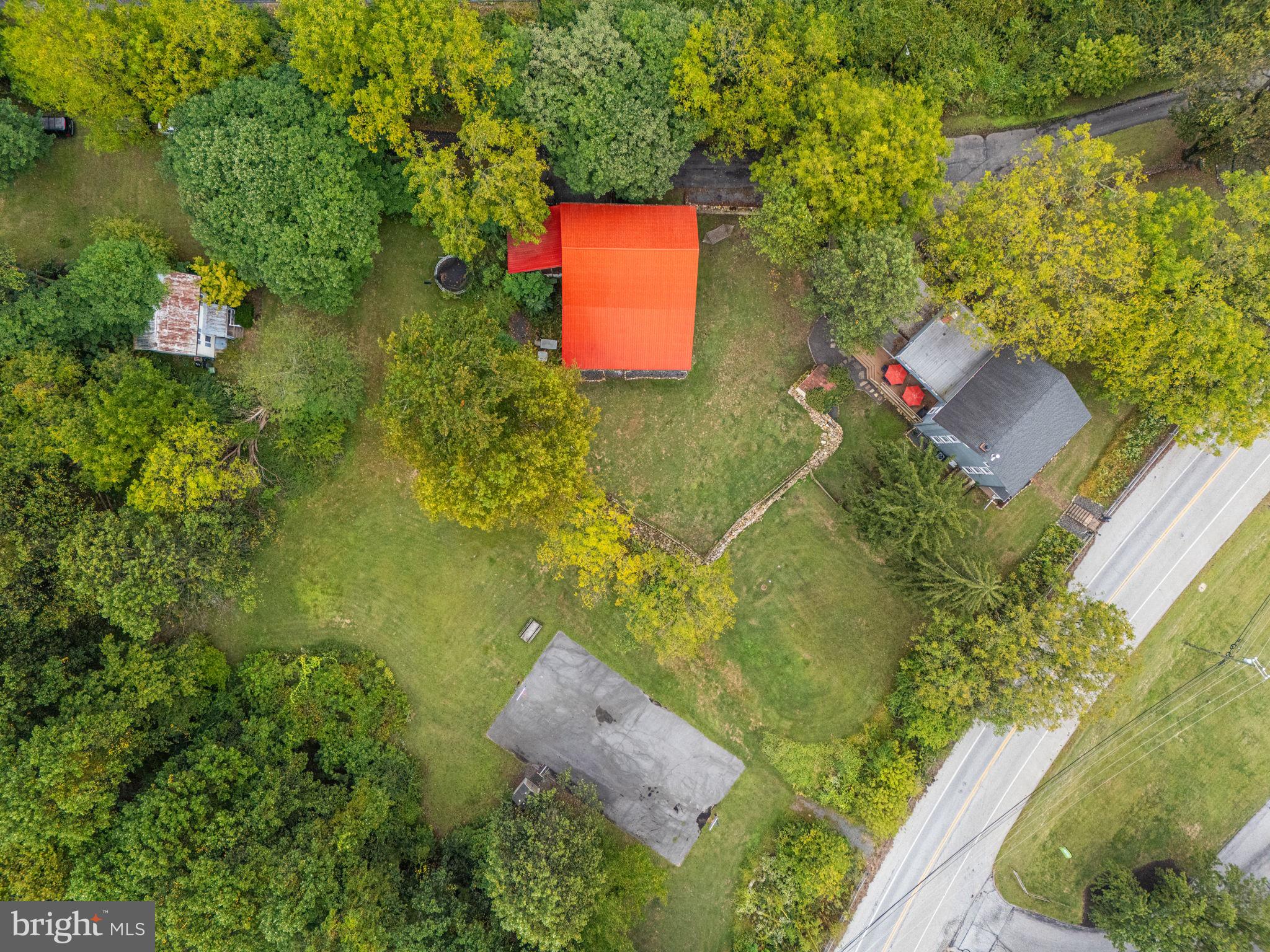 4701 Edges Mill Road Downingtown, PA 19335 - Photo 4 of 56 an aerial view of residential house with outdoor space and trees all around