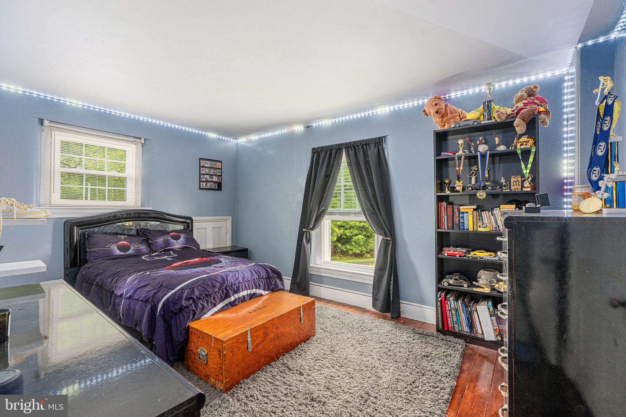 4701 Edges Mill Road Downingtown, PA 19335 - Photo 42 of 56 a bedroom with a bed furniture and a window