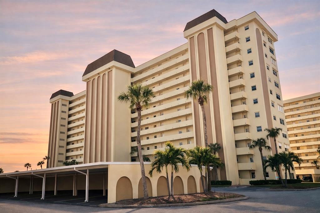 a front view of a building with a street