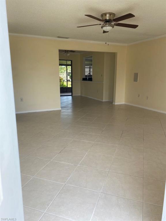 134 Blue Ridge Drive Naples, FL 34112 - Photo 17 of 26 View from living room to dinning