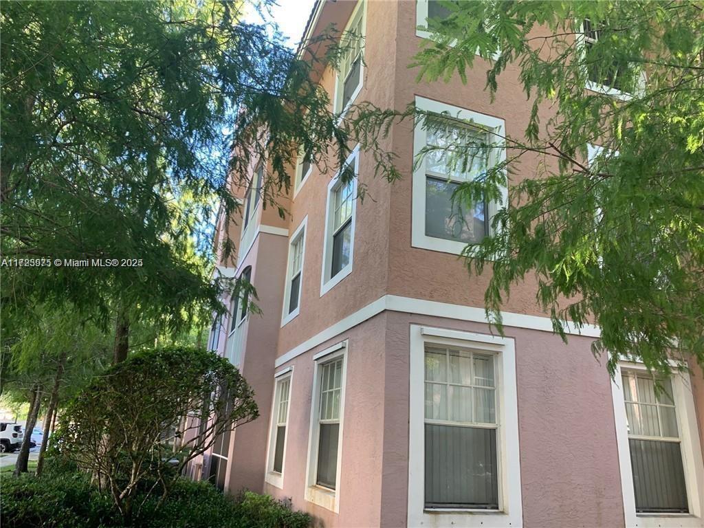 6776 West Sample Road, Unit 6776 Coral Springs, FL 33067 - Photo 13 of 20 a view of a building