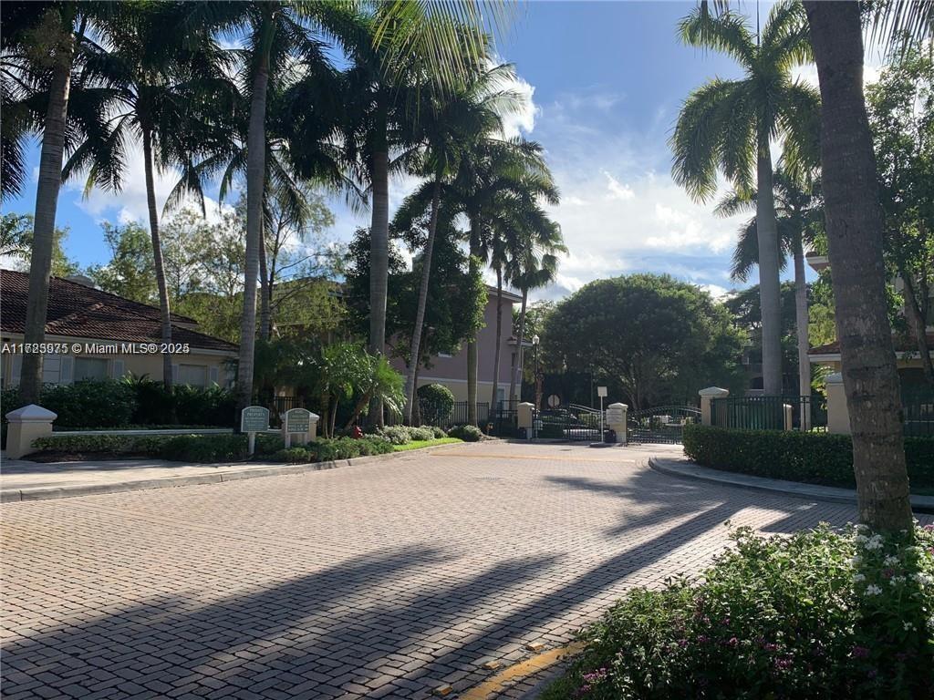 6776 West Sample Road, Unit 6776 Coral Springs, FL 33067 - Photo 16 of 20 a street view of a house