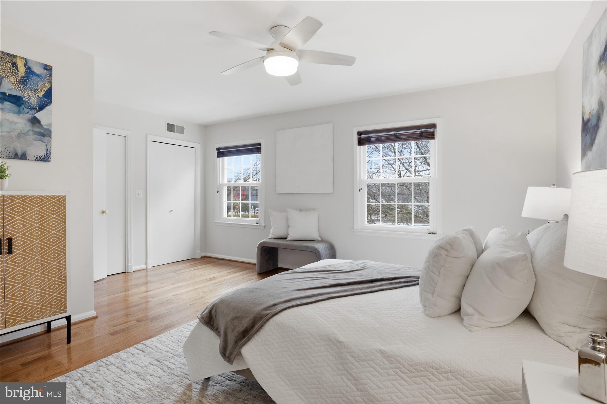 4851 Sangamore Road, Unit 25 Bethesda, MD 20816 - Photo 22 of 41 a bedroom with a bed and wooden floor
