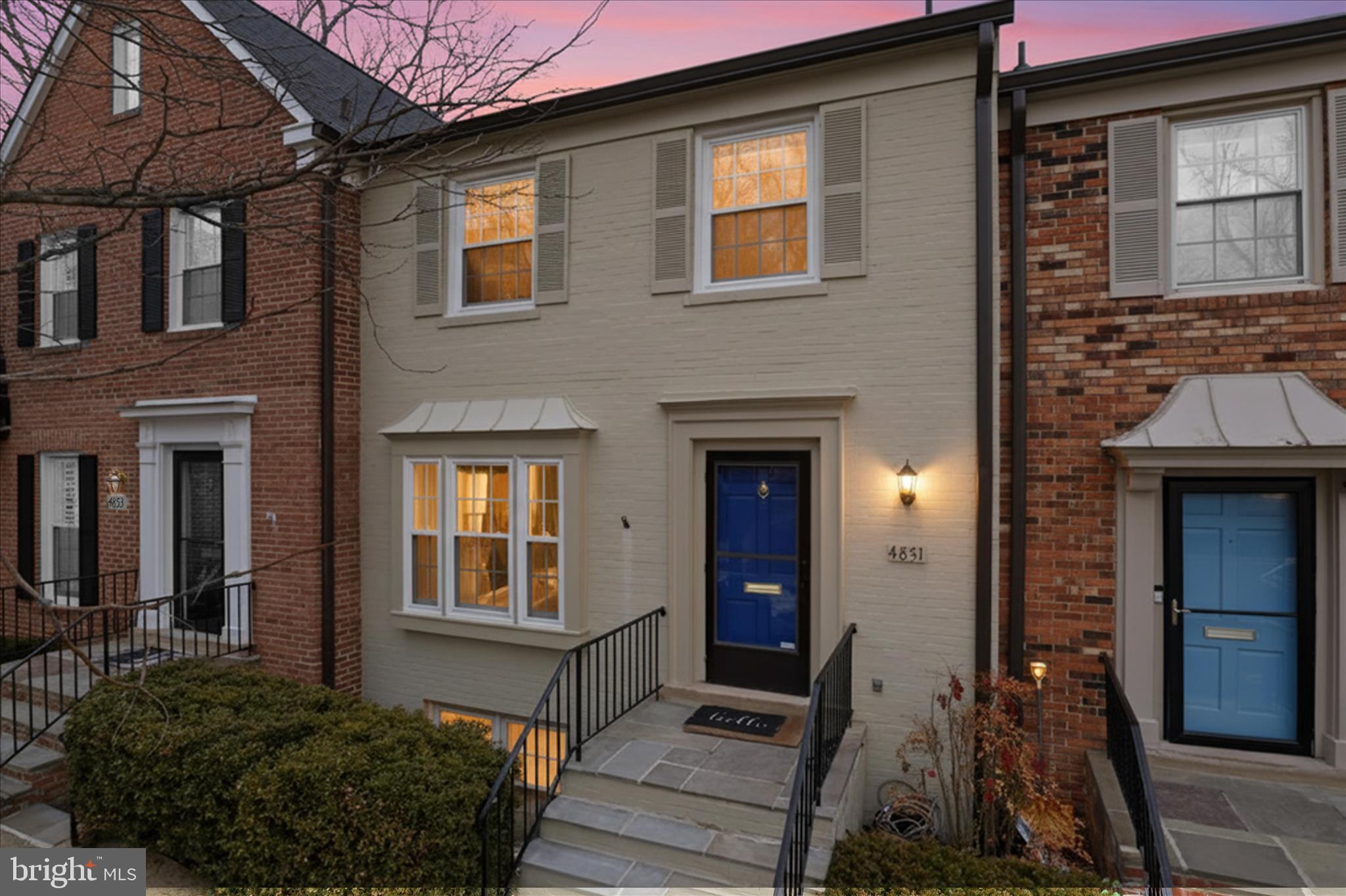 4851 Sangamore Road, Unit 25 Bethesda, MD 20816 - Photo 40 of 41 a front view of a house with a yard