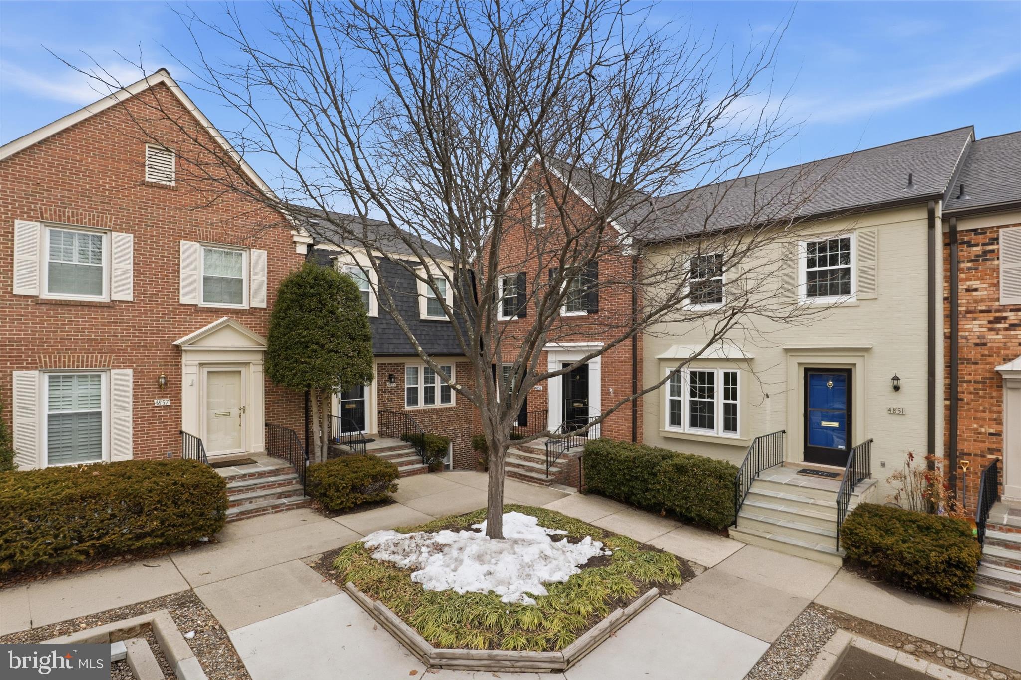 4851 Sangamore Road, Unit 25 Bethesda, MD 20816 - Photo 41 of 41 a front view of a house with garden