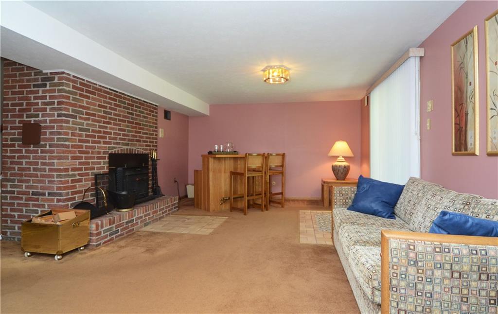 201 Lytton Road Coraopolis, PA 15108 - Photo 21 of 25 LOWER LEVEL GAME ROOM-SLDING GLASS DOOR LEADS TO COVERED PATIO.