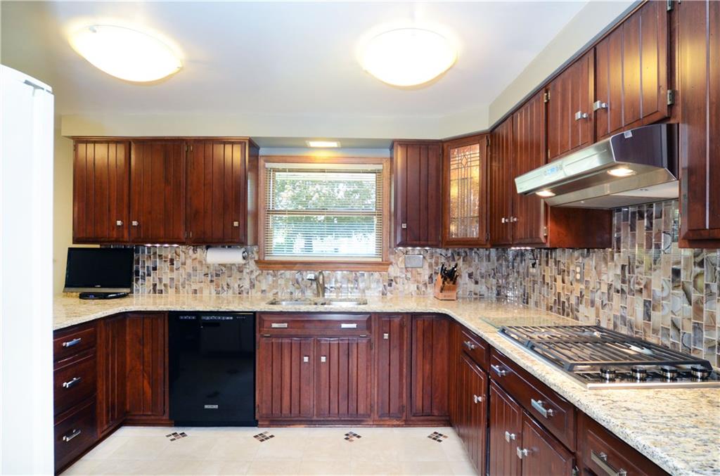 201 Lytton Road Coraopolis, PA 15108 - Photo 8 of 25 WELL-PLANNED KITCHEN FOR FUNCTION AND MOST DISCERNING COOK.