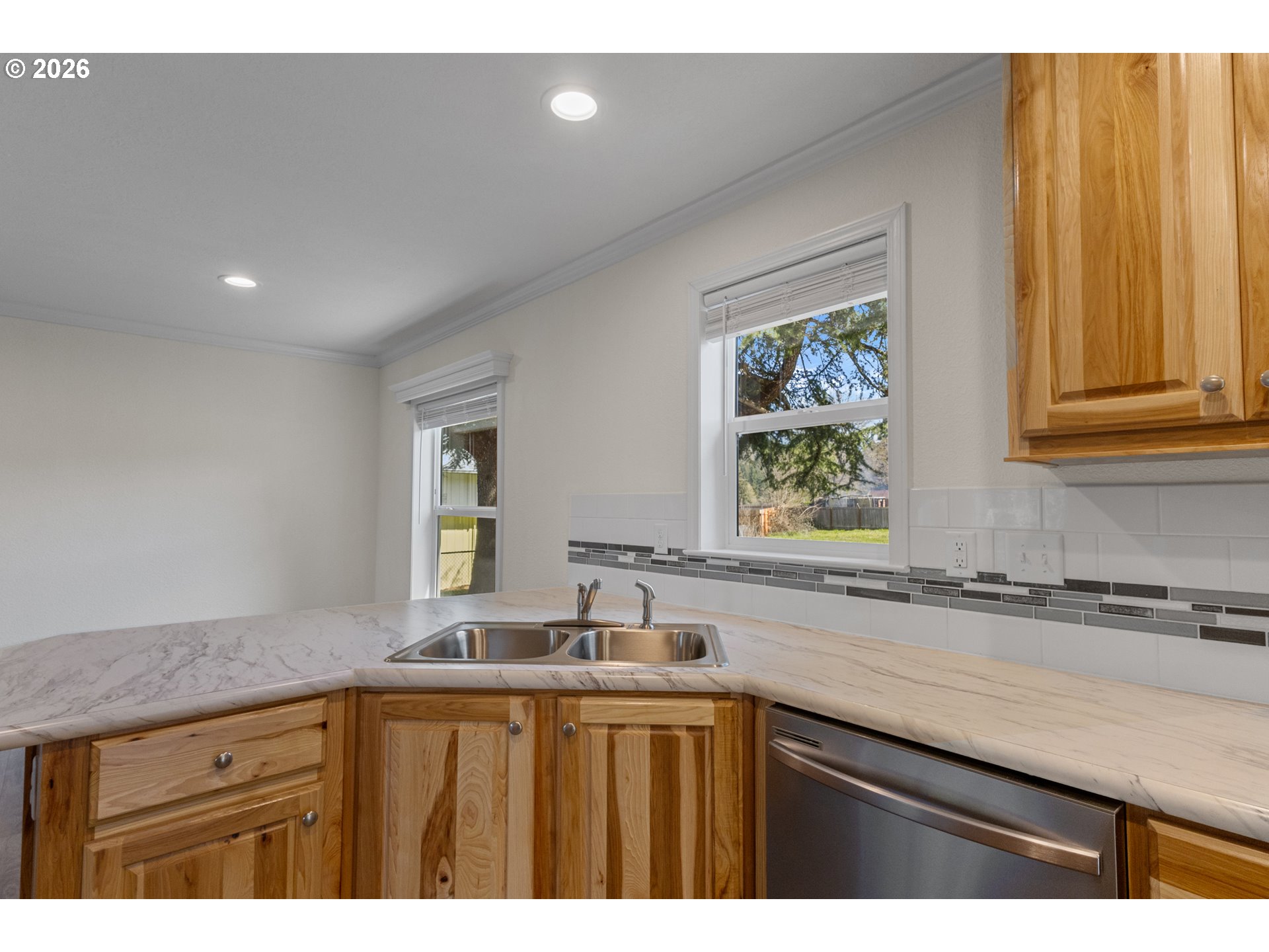 365 Mountain View Road Sweet Home, OR 97386 - Photo 9 of 32 a kitchen with sink cabinets and window