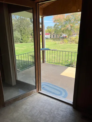 a view of a room with an outdoor space