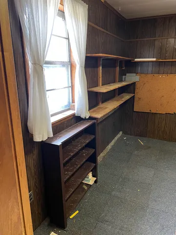 a view of a hallway with closet