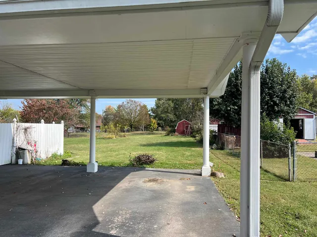 a view of a porch with garden