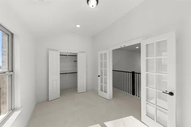 a view of a room with walk in closet and window