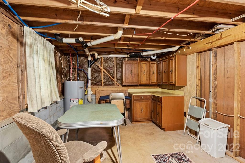 677 Monteith Branch Road Sylva, NC 28779 - Photo 33 of 48 a view of a room that has a table and chairs in it