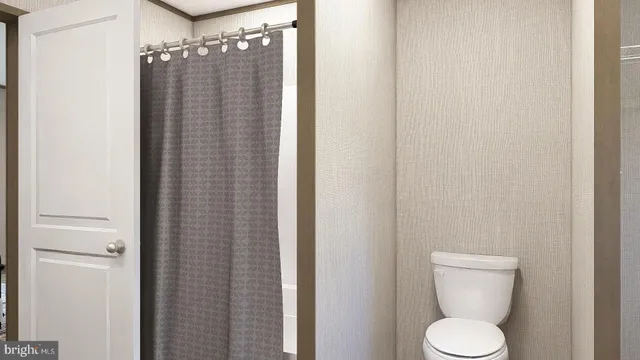 a bathroom with a toilet