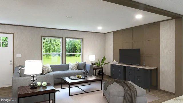 a living room with furniture a lamp and a flat screen tv