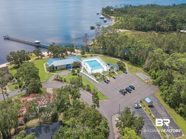 1325 Ridgewood Drive Lillian, AL 36549 - Photo 27 of 32 Drone / aerial view of a nearby body of water and a pool area