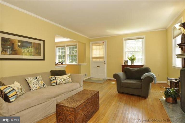 11710 Lytle Street Silver Spring, MD 20902 - Photo 7 of 30 a living room with furniture and a window