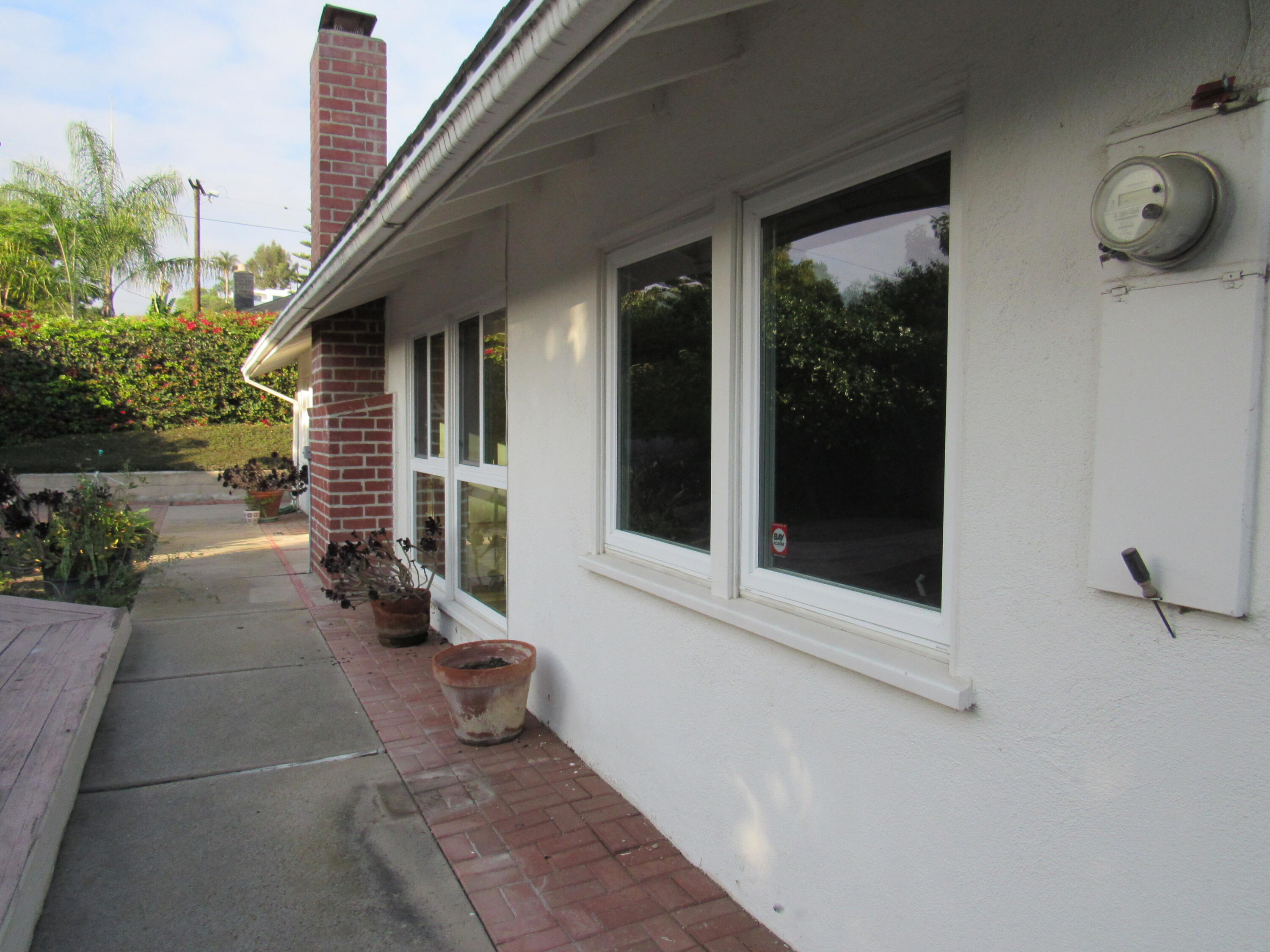 343 Salida Del Sol Santa Barbara, CA 93109 - Photo 15 of 20 a view of a house with backyard and porch