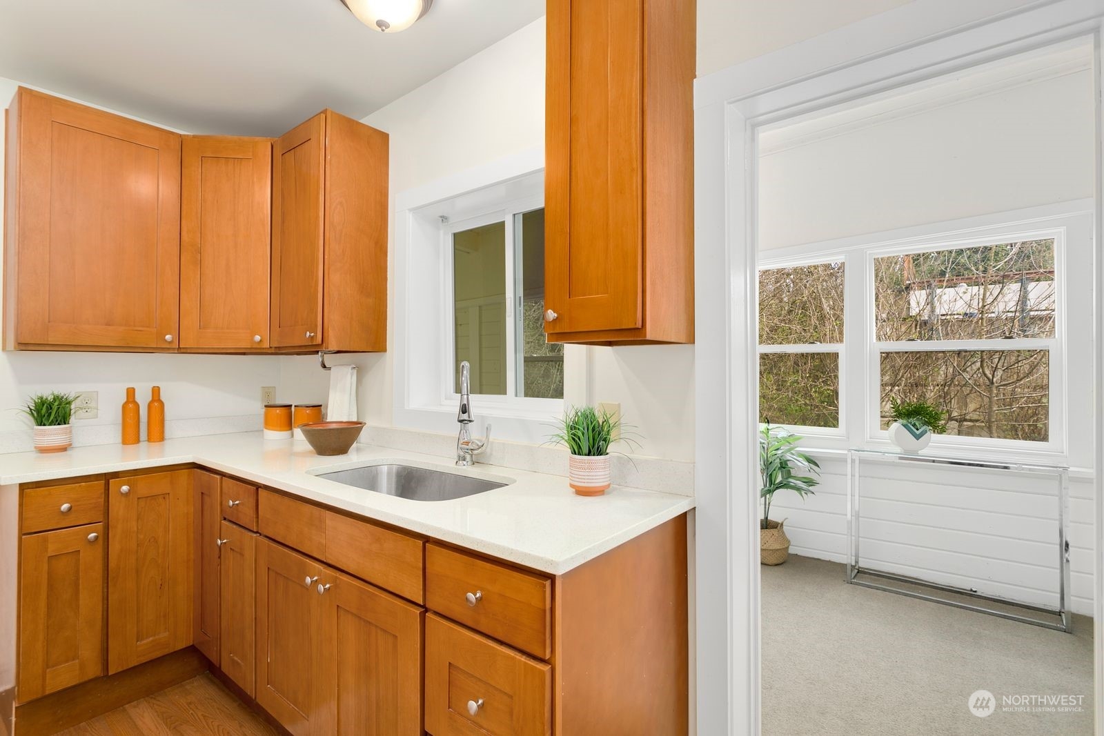 2808 Southwest Genesee Street Seattle, WA 98126 - Photo 17 of 29 a kitchen with a sink cabinets and window