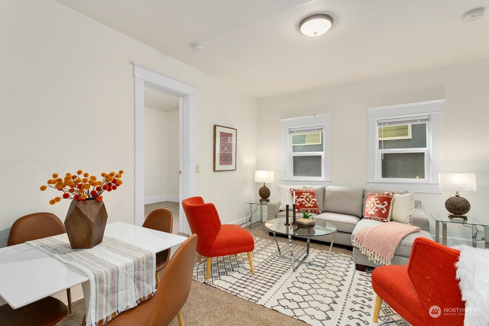 2808 Southwest Genesee Street Seattle, WA 98126 - Photo 22 of 29 a living room with furniture and flowers