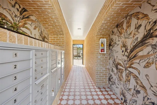 a view of a entryway with brick walls