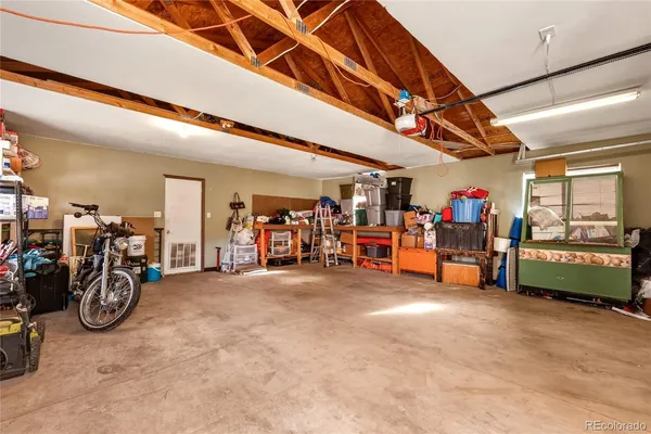 a view of a garage with storage
