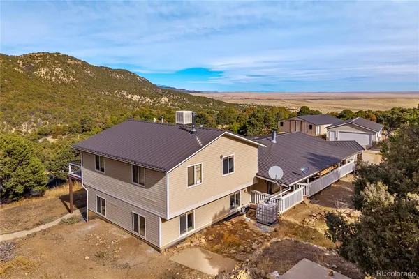 a view of a house with a mountain