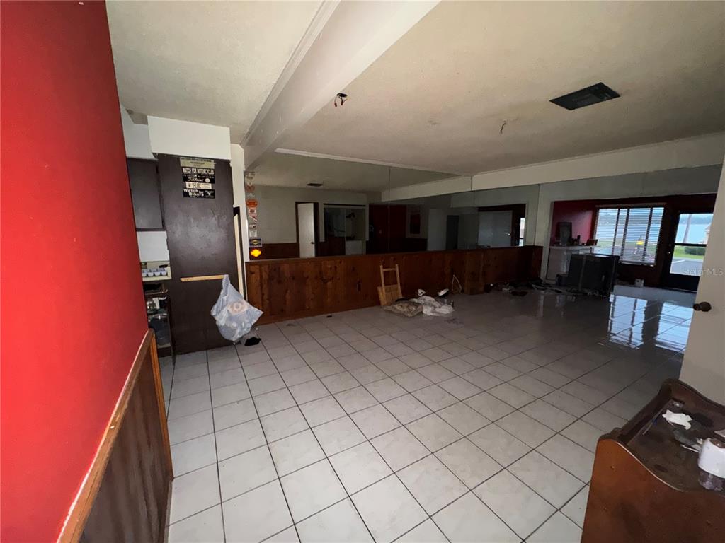 11001 Southeast Sunset Harbor Road, Unit D21 Summerfield, FL 34491 - Photo 11 of 15 a living room with furniture