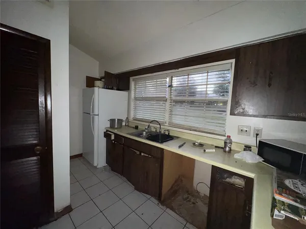 $200,000 | 11001 Southeast Sunset Harbor Road, Unit D21, Summerfield, FL 34491