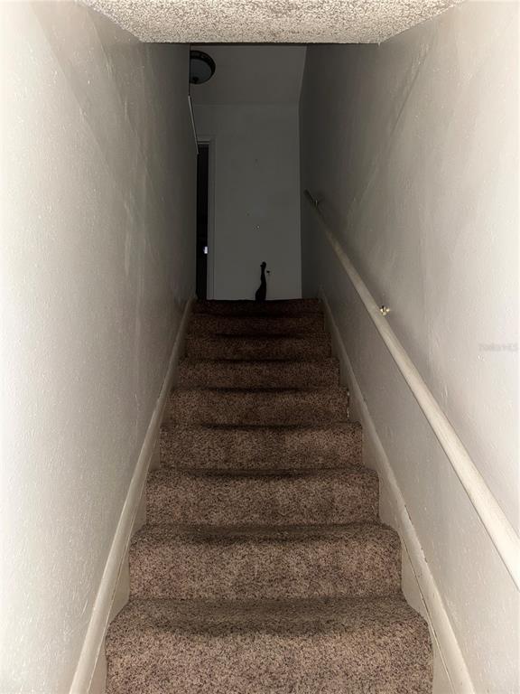 11001 Southeast Sunset Harbor Road, Unit D21 Summerfield, FL 34491 - Photo 7 of 15 a view of entryway