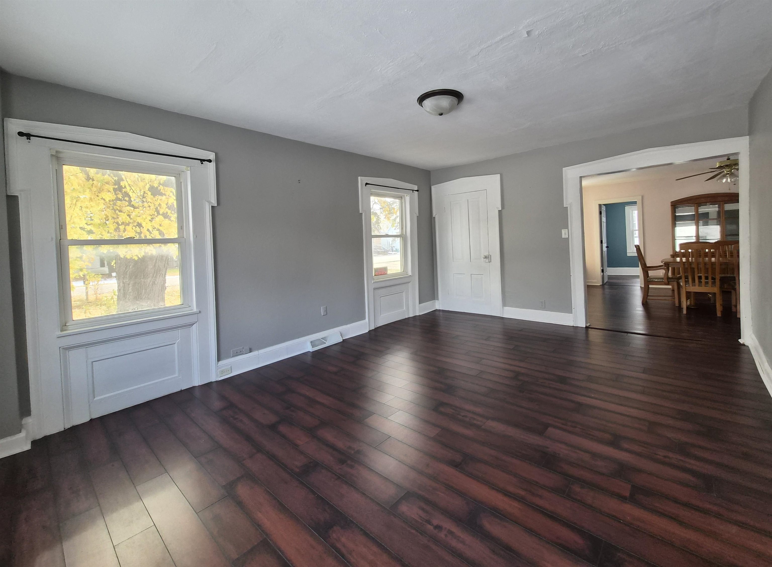 301 West Main Street Durand, IL 61024 - Photo 13 of 32 a view of empty room with window and wooden floor