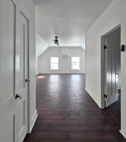 a view of hallway with natural light