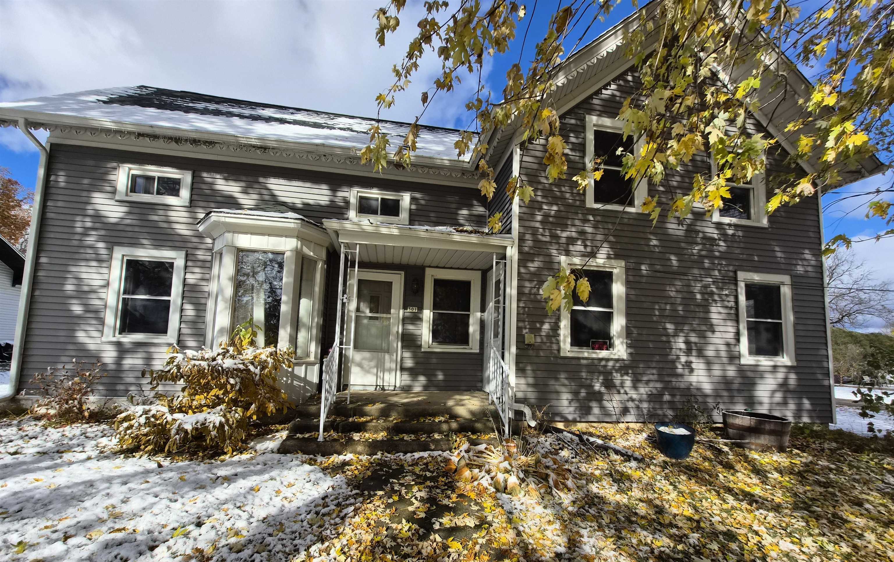 301 West Main Street Durand, IL 61024 - Photo 32 of 32 front view of a brick house with a large window