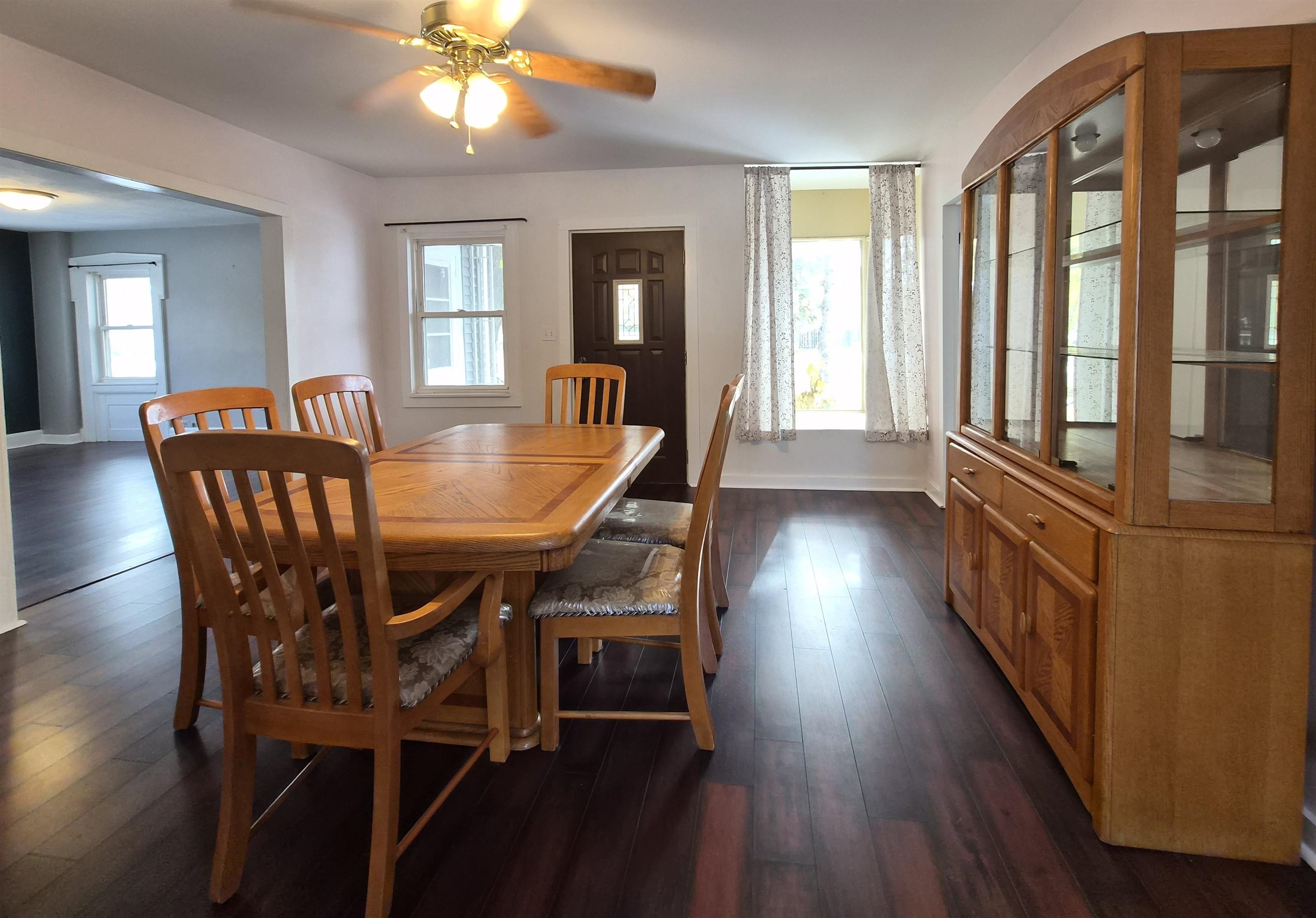 301 West Main Street Durand, IL 61024 - Photo 10 of 32 a dining room with furniture window wooden floor